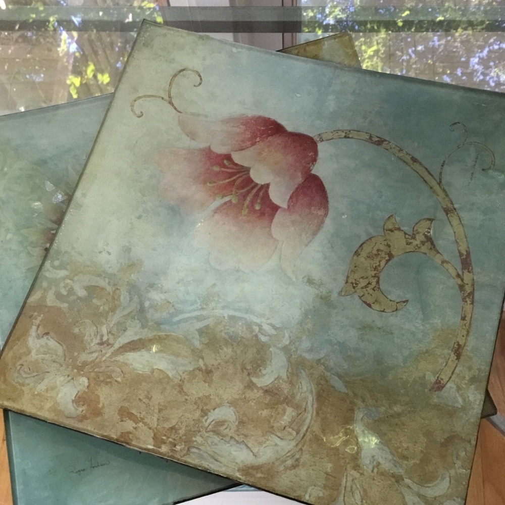 Pair of Regina Andrew decorative plates.